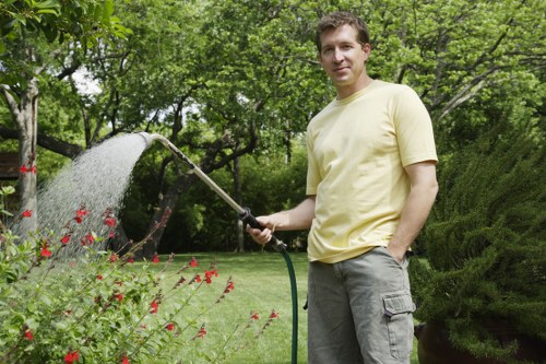 Gardeners sorting green waste in an Islington garden